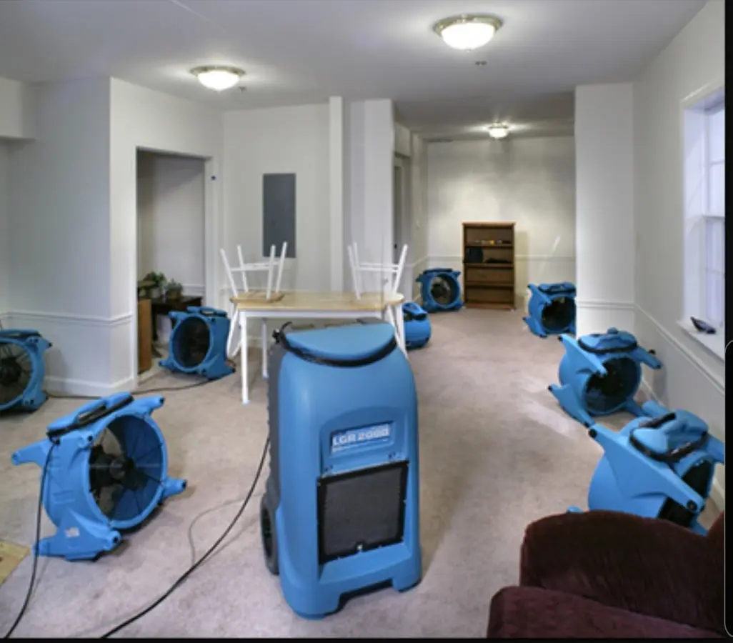 Air movers and dehumidifier setup for Water Damage Restoration in Cocoa
